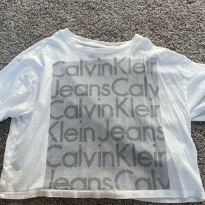 Woman loose T shirt. Print on the front and plane back